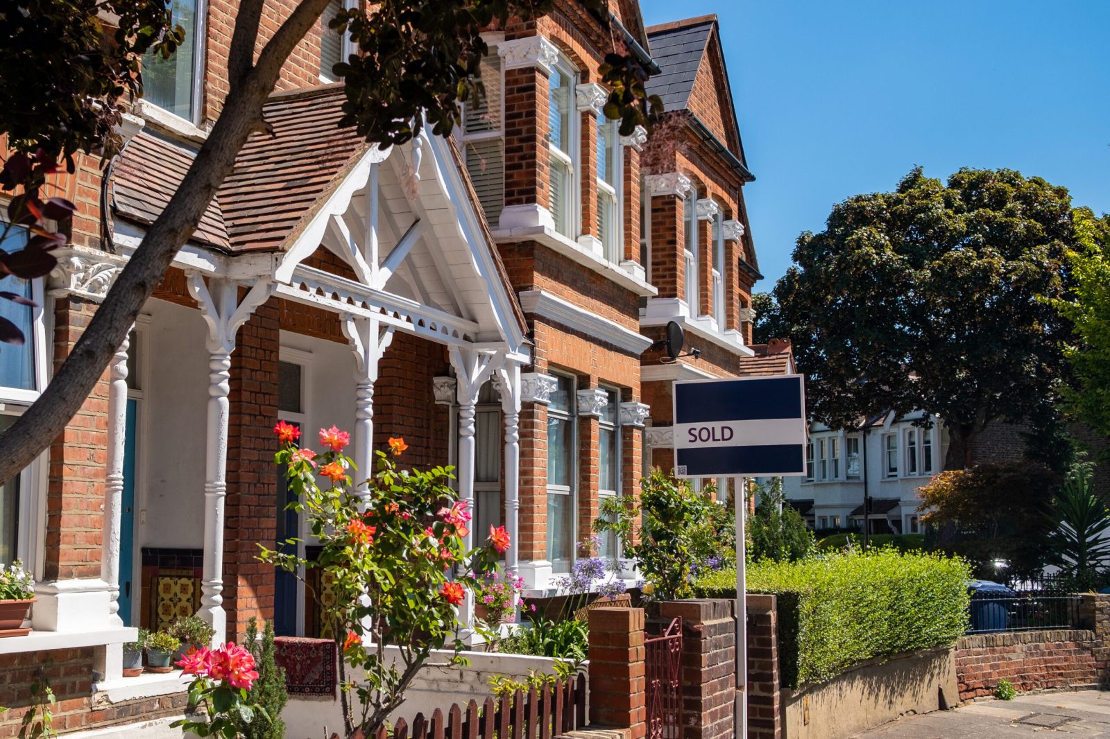 Victorian townhouse for sale on a sunny street in Derbyshire